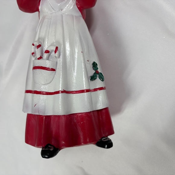 Mrs Claus figurine holding a tray of red cupcakes. - Picture 7 of 7